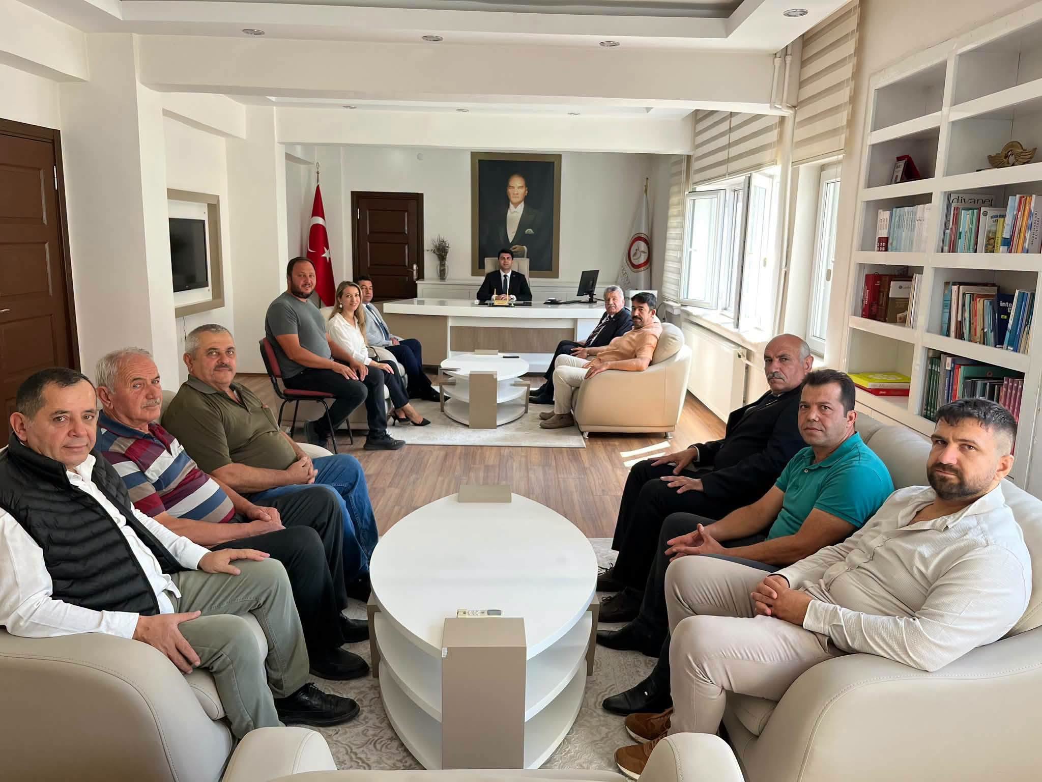 Belediye Başkanımız, MHP İlçe Başkanı ve Meclis Üyelerimizden Kaymakam Muhammet Samet BAHAR' ı Makamında Ziyaret